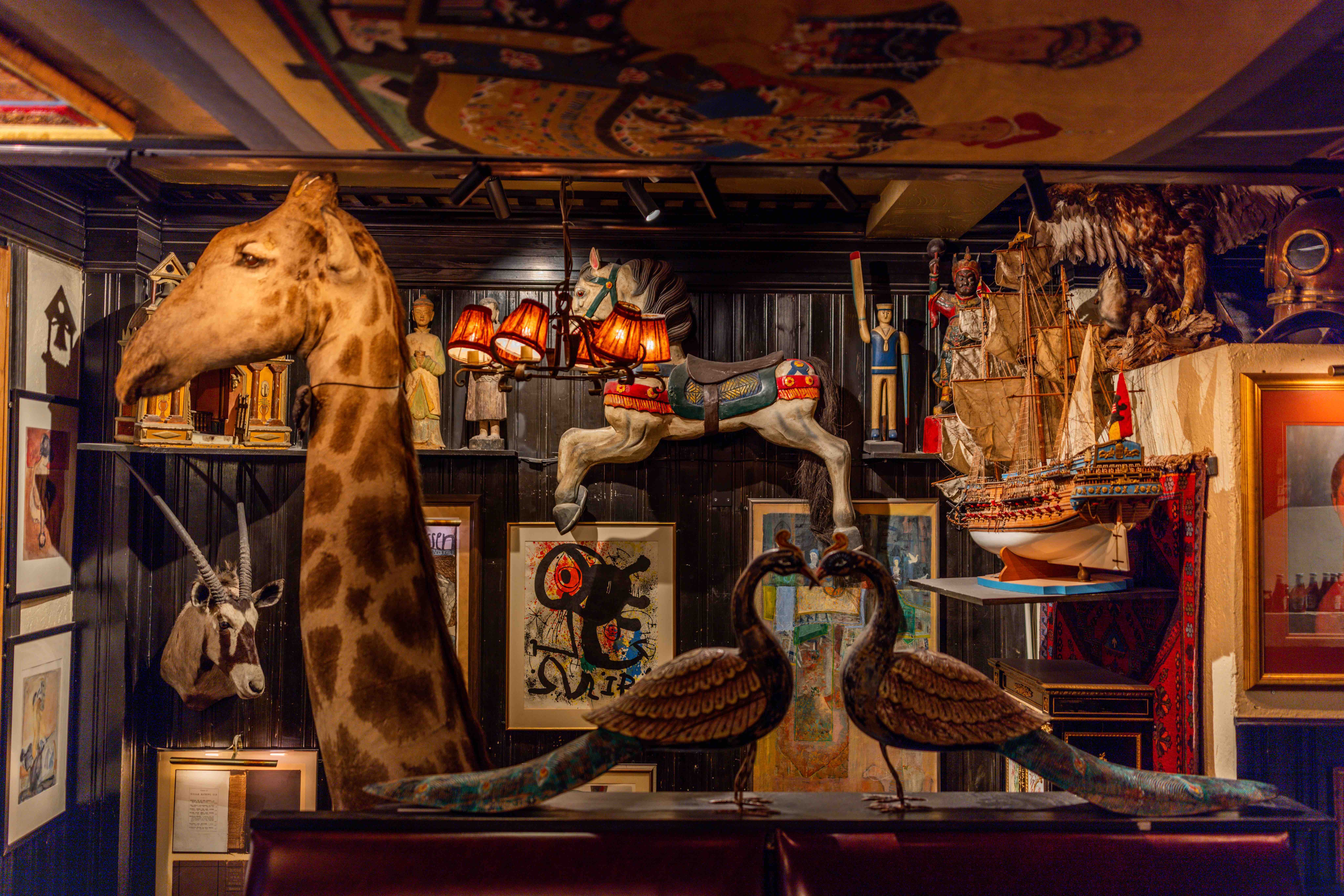 Taxidermy giraffe in Lorry